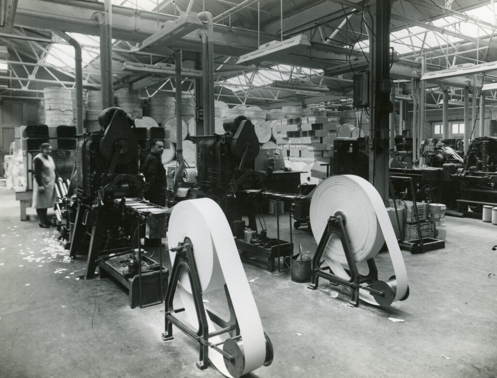 Black and white photo of a print workshop
